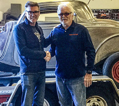 Mike Scheller and a pleased customer.